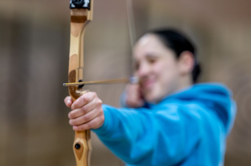 Sophie at Kielder Waterside demonstrating archery