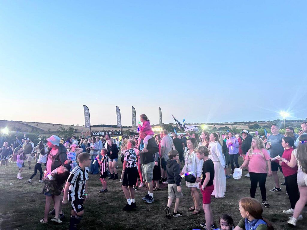 Grown-ups and children dancing at Derwent Fest