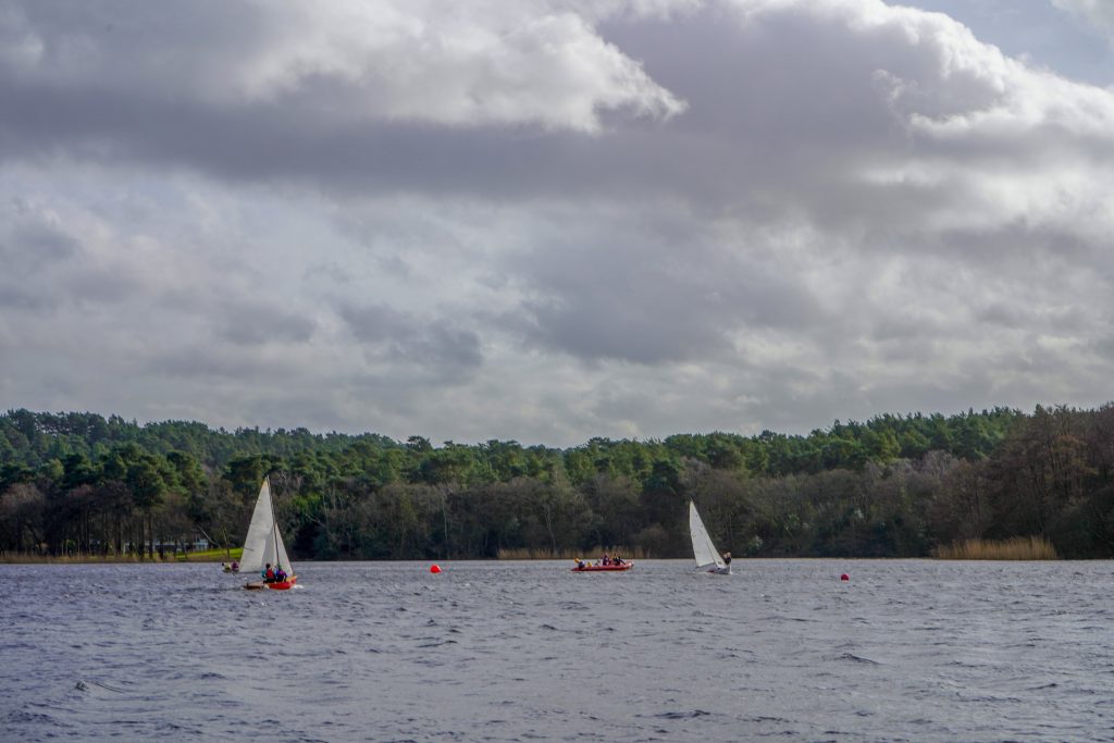 Two sail boats on the reservoir at Hanningfield Waterside Park