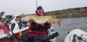 Scaling Dam Fishing